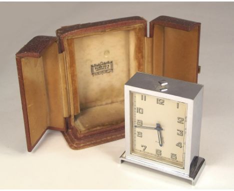 ART DECO ALARM CLOCK.An Art Deco, Swiss chromium cased alarm clock in fitted Harrods travelling case. Height 9cm.