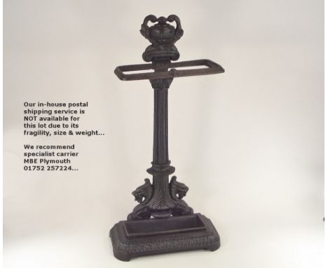 STICK STAND. A cast iron stick stand. Height 68cm.