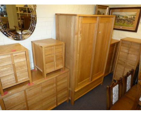 Willis & Gambier light oak six piece bedroom suite comprising double door wardrobe, six, five and three drawer chests and pai