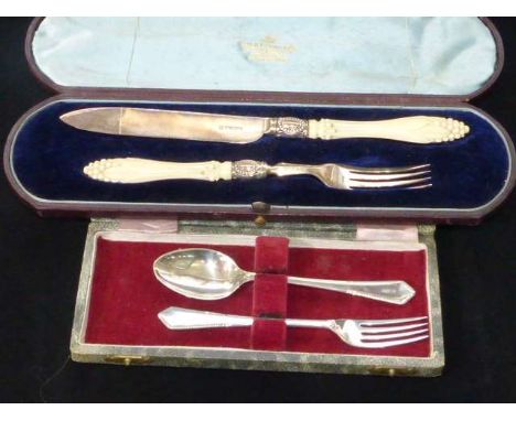 Victorian silver and ivory-handled knife and fork, Sheffield 1867, cased; and a silver christening fork and spoon, boxed