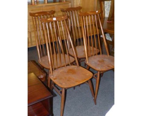 Set of four elm seated dining chairs, probably Ercol
