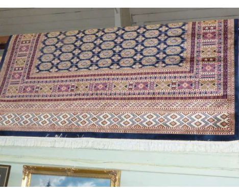 Blue ground Bokhara carpet 2.80 x 2.00