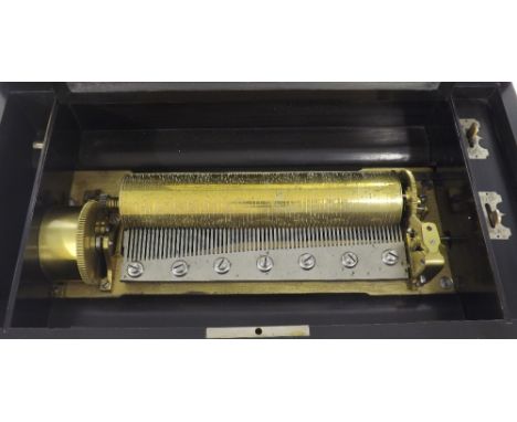 Swiss music box, playing on eight airs, the 9.25" cylinder within a rosewood inlaid ebony bound box, with original tune sheet