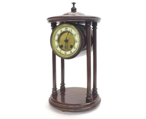 Mahogany drumhead portico two train mantel clock striking on a bell, the 3.75" cream chapter ring enclosing a recessed gilded