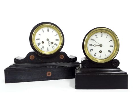 Black slate two train drumhead mantel clock striking on a bell, the 4.25" circular dial within a drumhead surround upon a ste