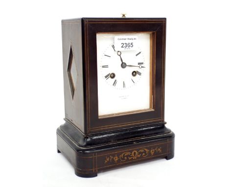 French mahogany and ebonised two train mantel clock, the movement with outside countwheel striking on a bell, the dial signed
