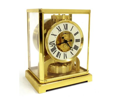 Jaeger LeCoultre Atmos clock, no. 449970, the 4.25" chapter ring enclosing a skeletonised centre within a glazed brass case, 