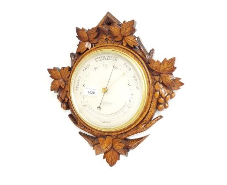 Oak cased circular barometer, the 8" silvered dial signed J. Ketterand, Strand, Cornhill and St. Paul's Churchyard, London, w