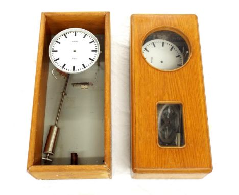 Two Favag electric master clocks for spares/repair, each in a light oak case, 27" high (2)