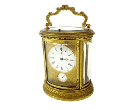 Fine French Drocourt grand sonnerie repeater oval carriage clock with alarm, the movement back plate bearing the Drocourt tra