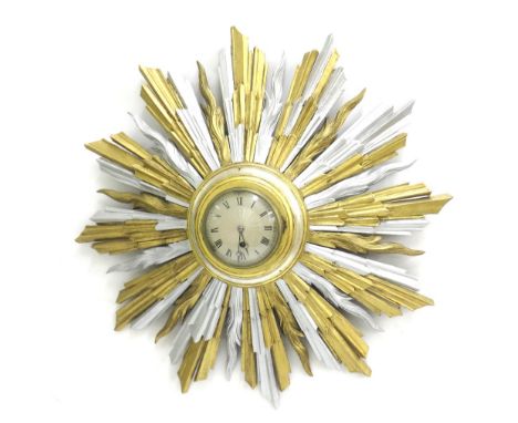 Sunburst wall timepiece, the 4" engine turned silvered dial within a carved sunburst surround with alternating gilt and silve