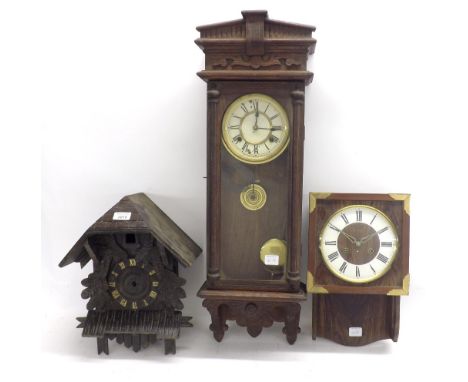 Waterbury two train wall clock within an oak glazed case, 30" high; also a contemporary two train wall clock and an antique c