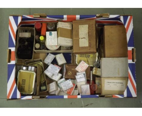 Assortment of watch and clock makers parts and accessories to include clock and watch mainsprings, clock hands, watch bushes 