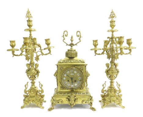 French brass two train mantel clock garniture, the movement with outside countwheel striking on a bell, the 3.75" ornate chap