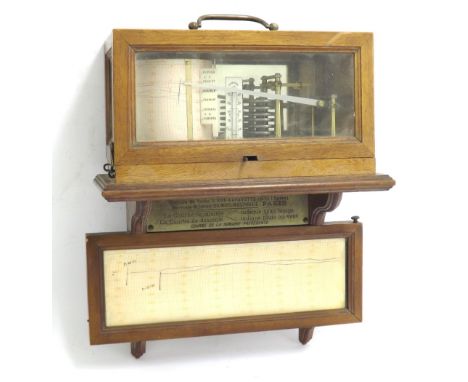 Unusual French wall barograph, within a light wooden bevelled glazed case with mirrored back and hinged side opening, over a 