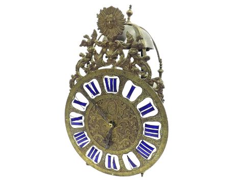 French verge lantern clock, the base plate signed Anne Clement, á Paris, the 10.5" brass repousse dial with Roman cartouche e