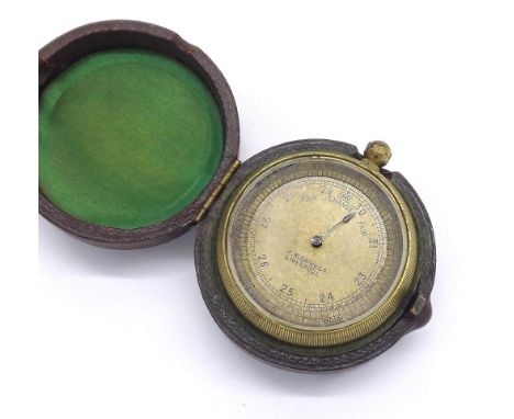 Brass cased aneroid pocket barometer, the dial signed J.W. Ray & Co., Liverpool, within a leather case, 47mm