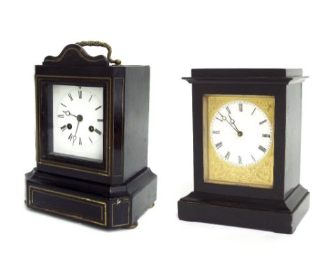 Small French ebonised mantel clock timepiece, the 2.75" white dial within an engraved gilded mask, within a stepped case, 6.5