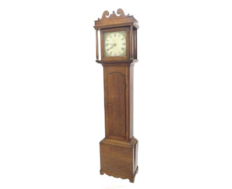 Oak thirty hour longcase clock, the 11" square painted dial signed Samuel Adcock, the case with long rounded arched door and 