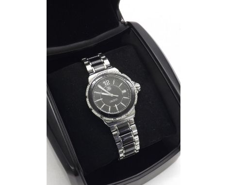 Tag Heuer Formula 1 stainless steel and ceramic diamond lady's bracelet watch, ref. WAH1212, serial no. RPJ0922, quartz, 37mm