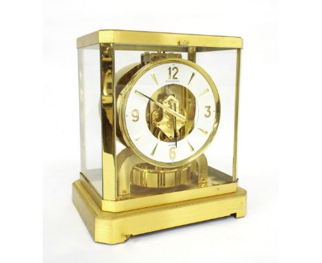 Jaeger LeCoultre Atmos clock, no. 318335, the 4.75" white dial enclosing a skeletonised centre, within a polished brass glaze