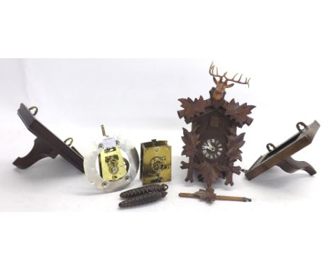Small contemporary Black Forest cuckoo clock, 11" high (pendulum and two weights); also a spring driven Vienna clock movement