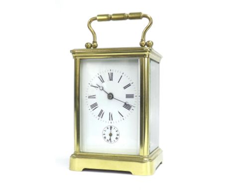 Good carriage clock with alarm and striking on a gong, within a corniche brass case, 6.5" high