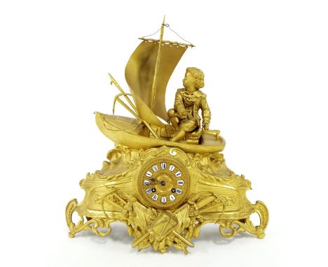 French gilt metal two train figural mantel clock striking on a bell, the 3.25" repousse dial with Roman cartouche enamel nume