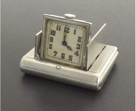 Tavannes Watch Co. Art Deco silver purse watch, the square silvered dial with luminous Arabic numerals and hands, the covers 