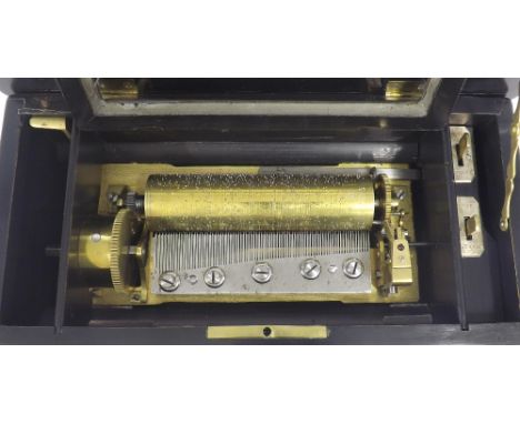 Small Swiss music box, playing on four airs, the 6" cylinder within a rosewood and ebony banded case with original tune sheet