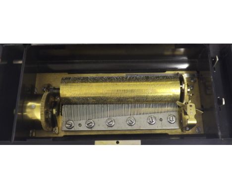 Swiss music box, playing on six airs, the 8.25" cylinder within a rosewood inlaid ebony bound box, with original tune sheet, 