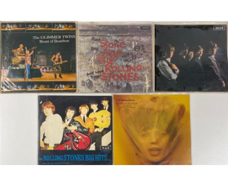 Five various Rolling Stones albums, including Stone Age.