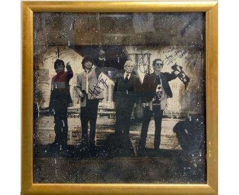 A large framed, signed Rolling Stones print, 79.5 x 78cm.