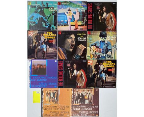 eleven various Rolling Stones records, including The Rolling Stones album.