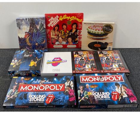 A quantity of sealed Rolling Stones board games, including Monopoly collector's edition, Trivial Pursuit and the Shmuzzle puz