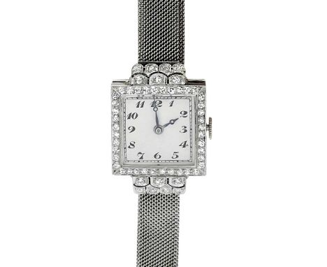 GOLDSMITH'S &amp; SILVERSMITH'S COMPANY - An Art Deco 18ct white gold and diamond set cocktail bracelet watch.  The 18mm whit