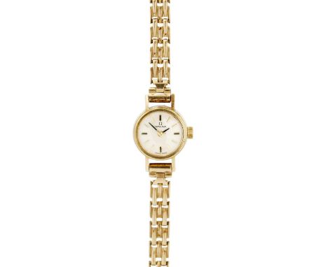 OMEGA - A 9ct lady's manual wind bracelet wristwatch. The signed dial with baton markers, cal. 650 17 jewel movement, London 