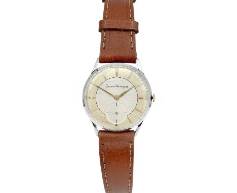 GIRARD-PERREGAUX - A stainless steel manual wind gentleman's wristwatch. The 30mm signed two tone textured dial with gilt bat