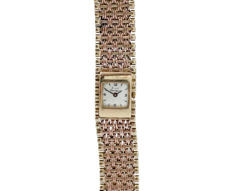 GIRARD-PERREGAUX - A 9ct lady's manual wind bracelet wristwatch. The signed 12mm square silvered dial with black Arabic and b