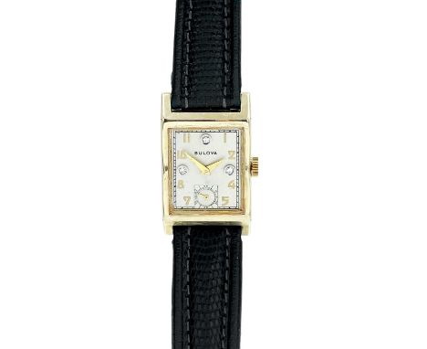 BULOVA - An Art Deco 14ct cased lady's manual wind dress watch with diamond markers. The signed 18mm silvered dial with styli