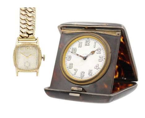 A Bulova gold-plated manual wind gentleman's wristwatch and a travel clock. The Bulova with 20mm signed dial with gilt Arabic