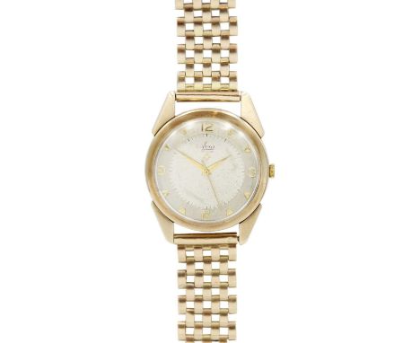 AVIA - A De Luxe 9ct gentleman's manual wind bracelet wristwatch. The signed 26mm silvered two textured dial with gilt Arabic