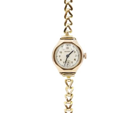 A 9ct lady's manual wind bracelet wristwatch. The 18mm dial signe EROS, the case hallmarked London 1938, bracelet stamped 9.3
