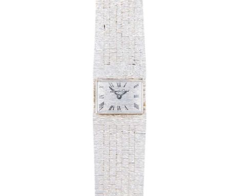 BUECHE-GIROD - A 9ct white gold lady's manual wind bracelet wristwatch. The 18mm signed silvered textured dial with black Rom