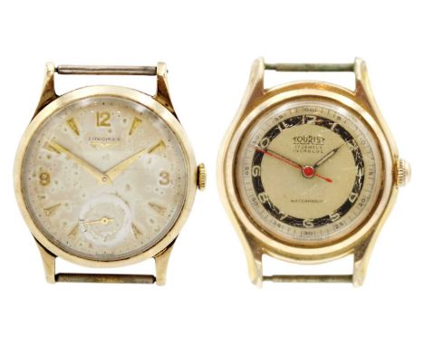 LONGINES - A 9ct gentleman's manual wind wristwatch. With signed 29mm silvered dial, gilt Arabic quarter numerals and dagger 
