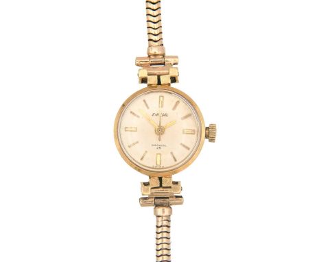 ENICAR - An Incabloc 25 lady's 18ct cased manual wind wristwatch with 9ct gold bracelet. The 14mm silvered dial with gilt bat