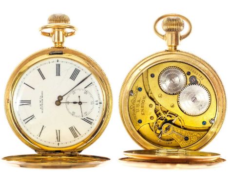 WALTHAM - A 14ct full hunter crown wind pocket watch. The signed 39mm white enamel dial with Roman numerals and subsidiary se