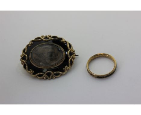 A Victorian gold and enamel mourning brooch; and a George III gold and enamel mourning ring inscibed Ann Dale obüt 1791