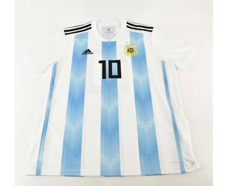 LIONEL MESSI; a signed Argentina football shirt, signed verso, size XL.Condition Report: Light creasing and fading, no certif