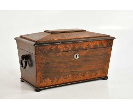 A good 19th century inlaid rosewood tea caddy with loop handles, the hinged cover enclosing two compartments and central glas